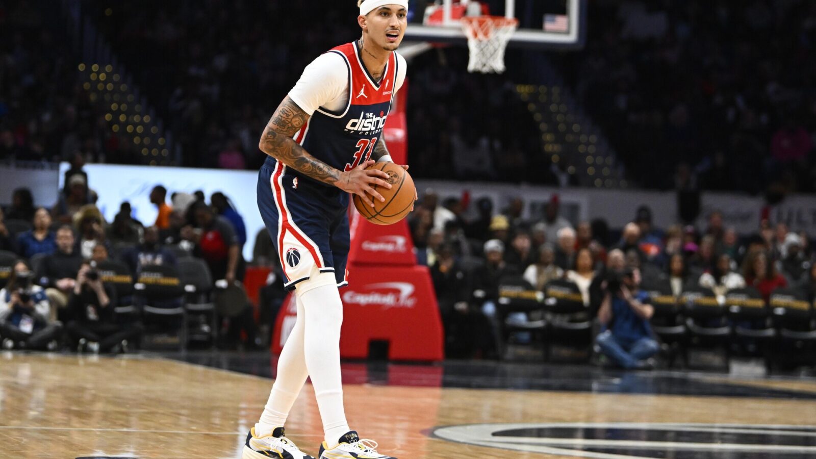 Nov 25, 2023; Washington, District of Columbia, USA; Washington Wizards forward Kyle Kuzma (33) looks on against the Atlanta Hawks during the second half at Capital One Arena.