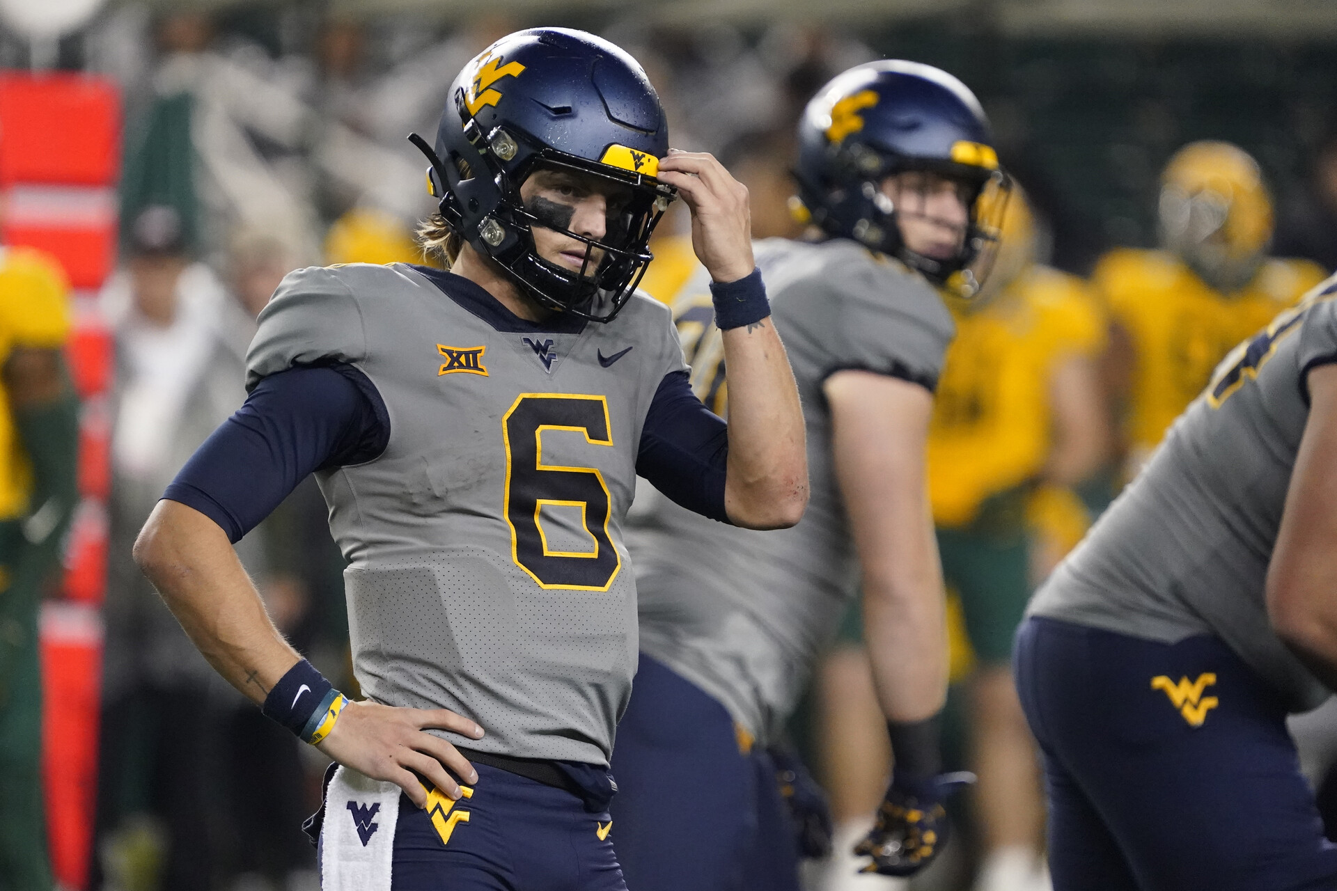 Nov 25, 2023; Waco, Texas, USA; West Virginia Mountaineers quarterback Garrett Greene (6) looks towards the bench pre-snap against the Baylor Bears during the second half at McLane Stadium.