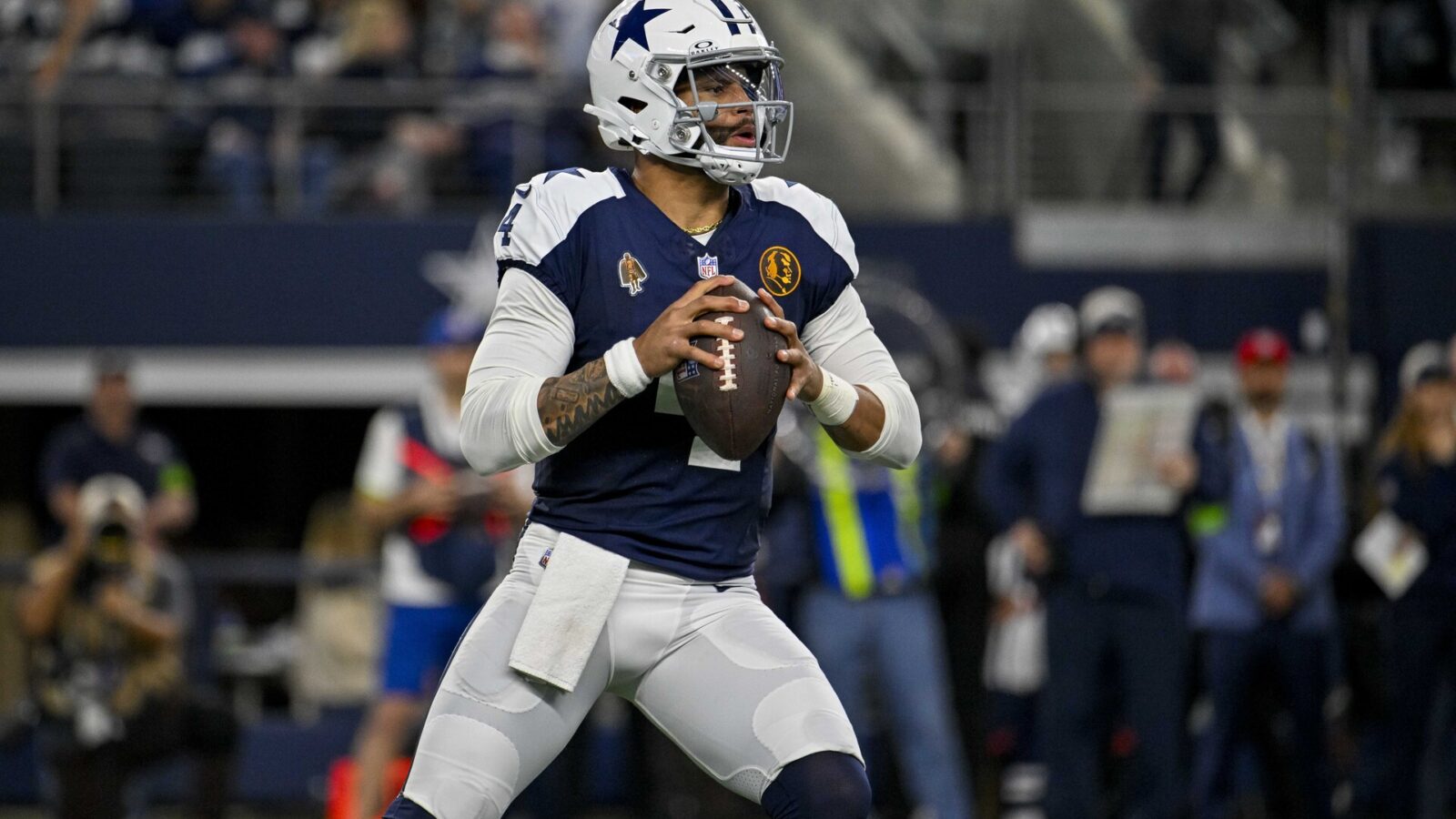 Dallas Cowboys quarterback Dak Prescott (4) in action during the game between the Dallas Cowboys and the Washington Commanders at AT&T Stadium.