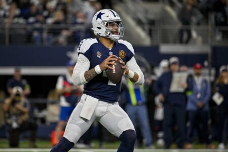 Dallas Cowboys quarterback Dak Prescott (4) in action during the game between the Dallas Cowboys and the Washington Commanders at AT&T Stadium.