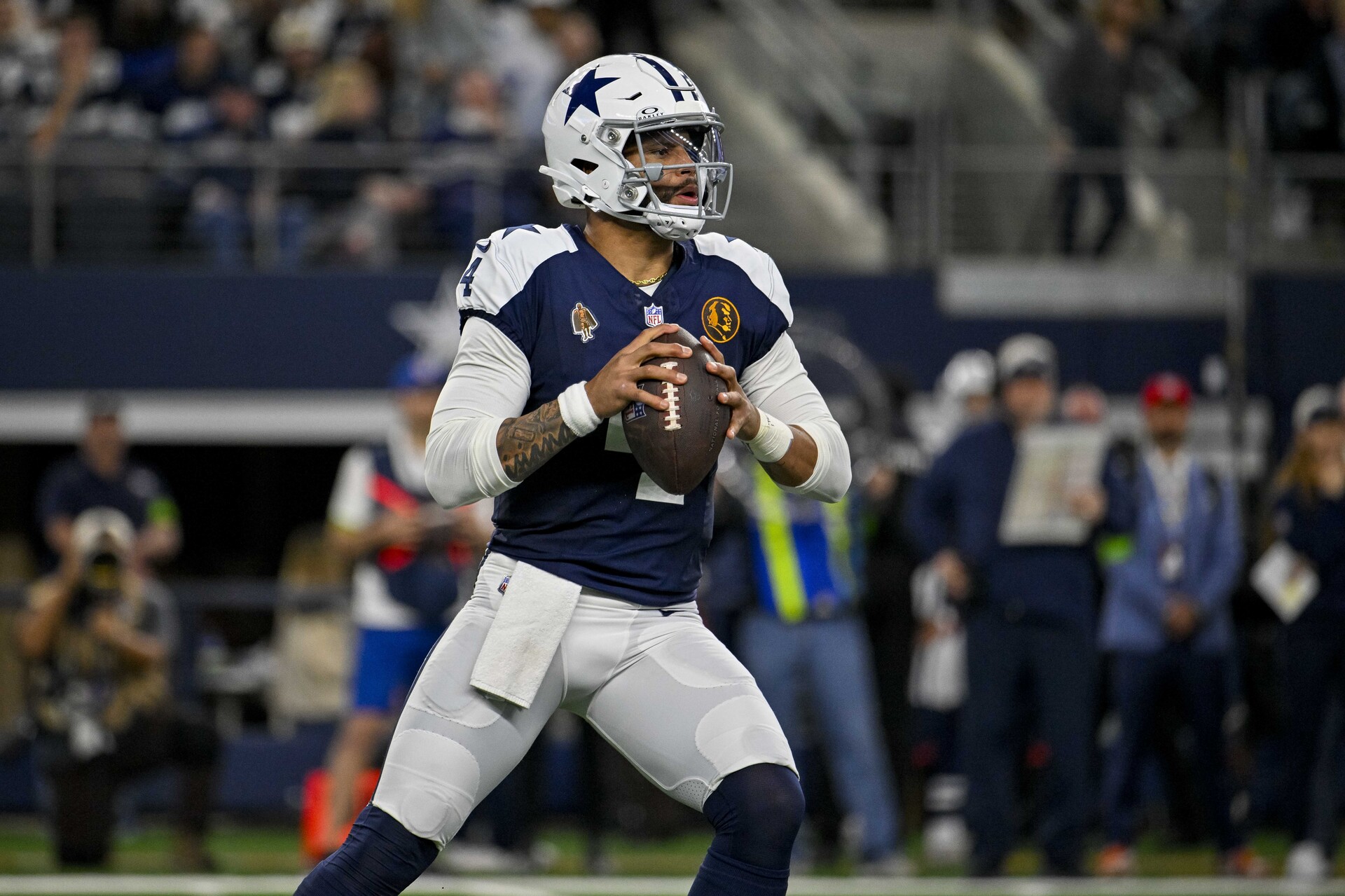 Dallas Cowboys quarterback Dak Prescott (4) in action during the game between the Dallas Cowboys and the Washington Commanders at AT&T Stadium.