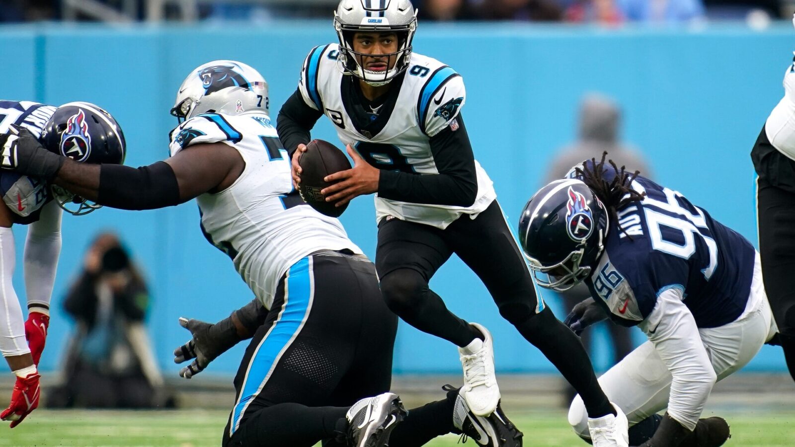 Carolina Panthers quarterback Bryce Young (9) runs the ball against the Tennessee Titans during the third quarter at Nissan Stadium in Nashville, Tenn., Sunday, Nov. 26, 2023.