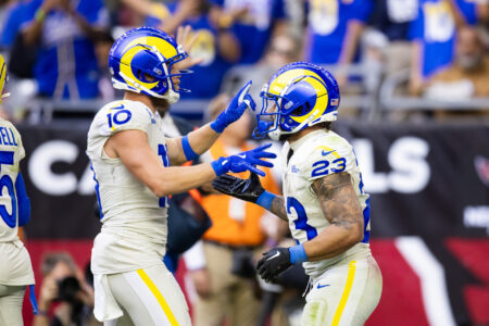 Nov 26, 2023; Glendale, Arizona, USA; Los Angeles Rams running back Kyren Williams (23) celebrates a touchdown with wide receiver Cooper Kupp (10) against the Arizona Cardinals in the first half at State Farm Stadium.