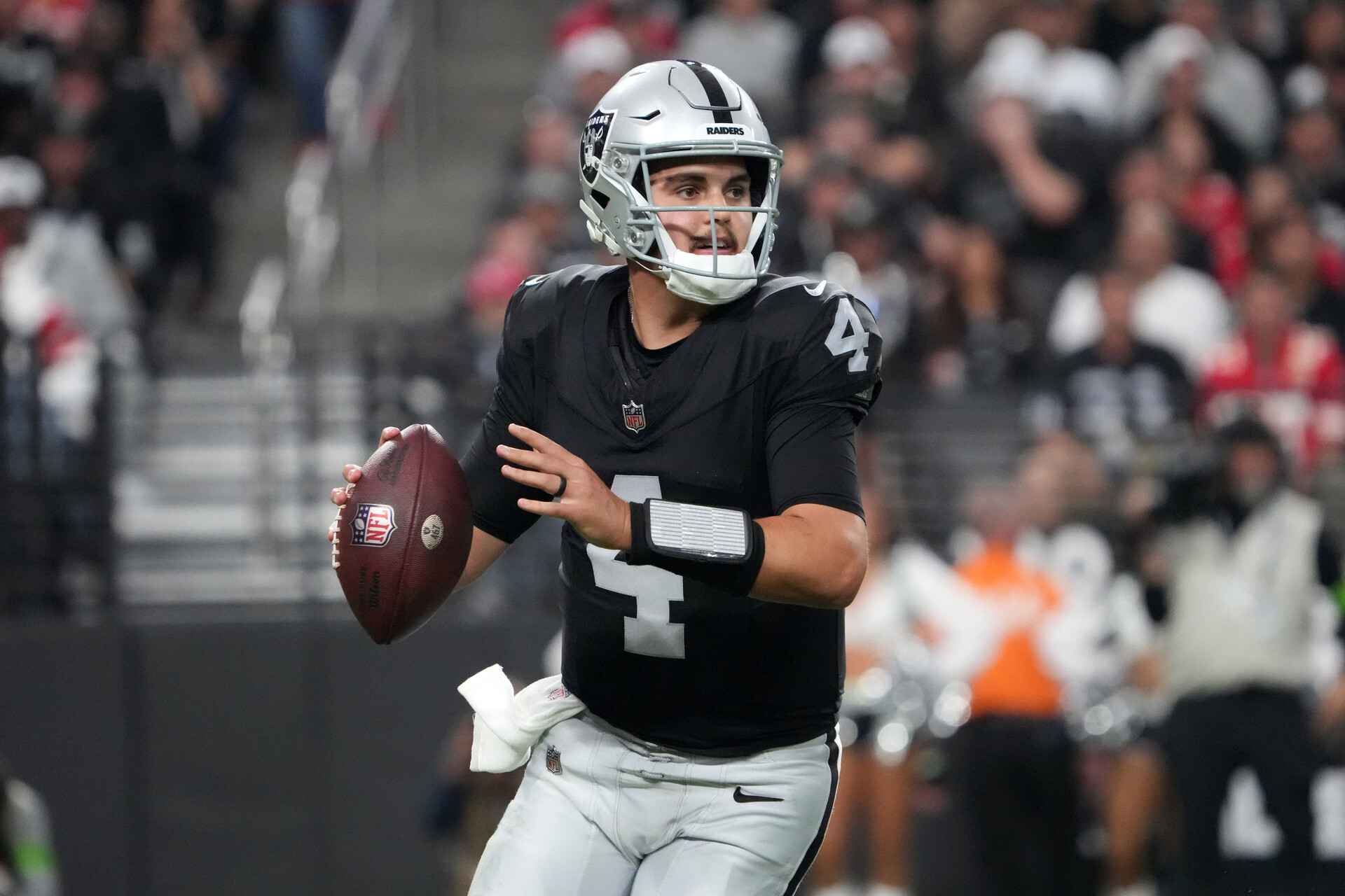 Nov 26, 2023; Paradise, Nevada, USA; Las Vegas Raiders quarterback Aidan O'Connell (4) throws the ball against the Kansas City Chiefs in the second half at Allegiant Stadium.