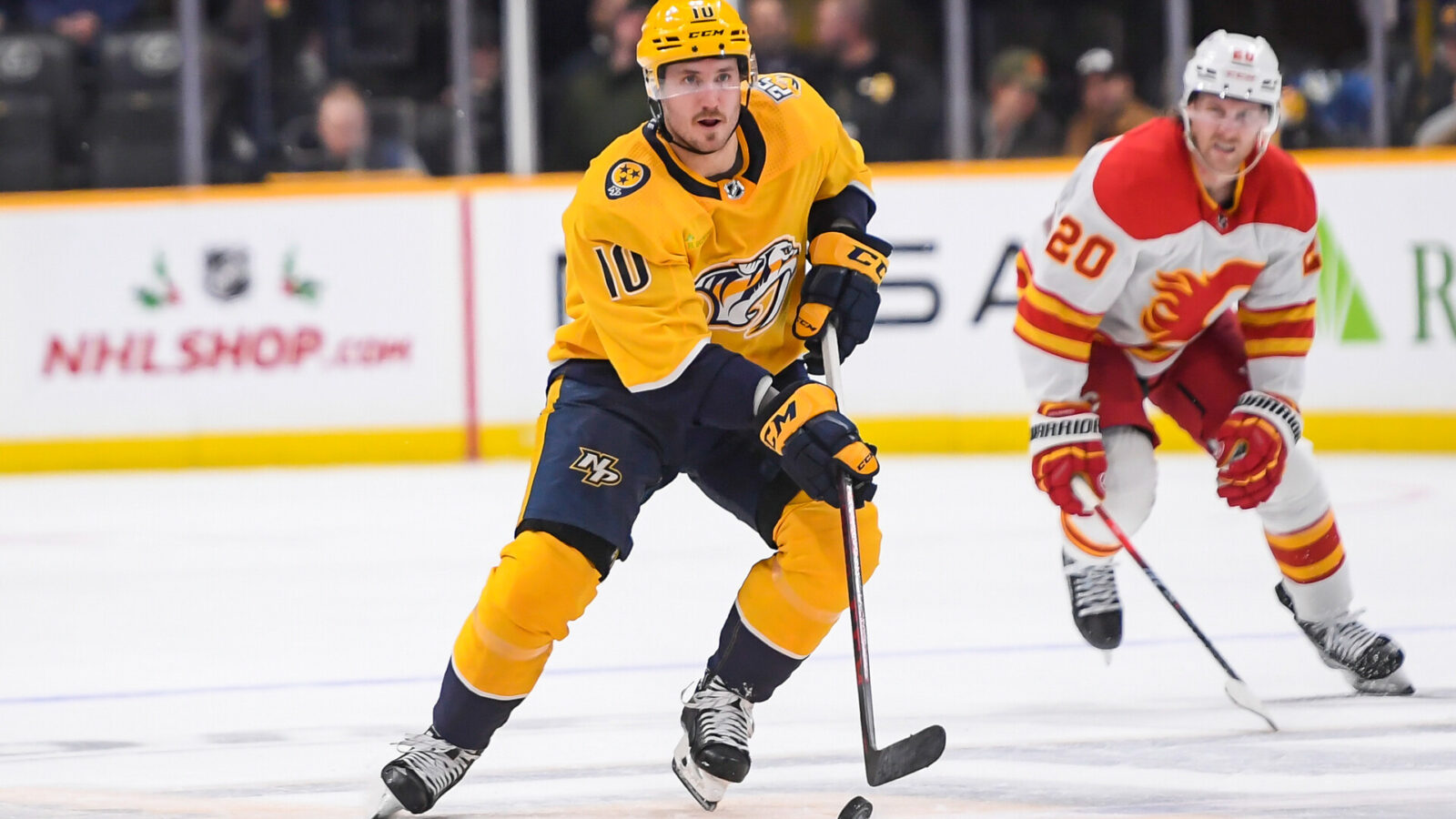 Nov 22, 2023; Nashville, Tennessee, USA; Nashville Predators center Colton Sissons (10) skates against the Calgary Flames during the third period at Bridgestone Arena.