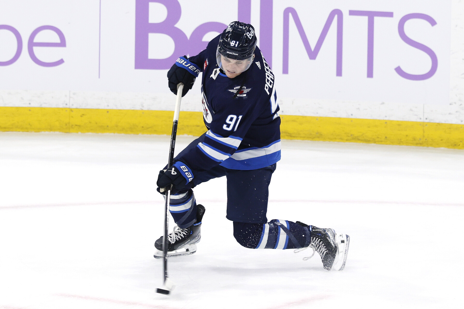 Nov 28, 2023; Winnipeg, Manitoba, CAN; Winnipeg Jets center Cole Perfetti (91) warms up before a game against the Dallas Stars at Canada Life Centre.