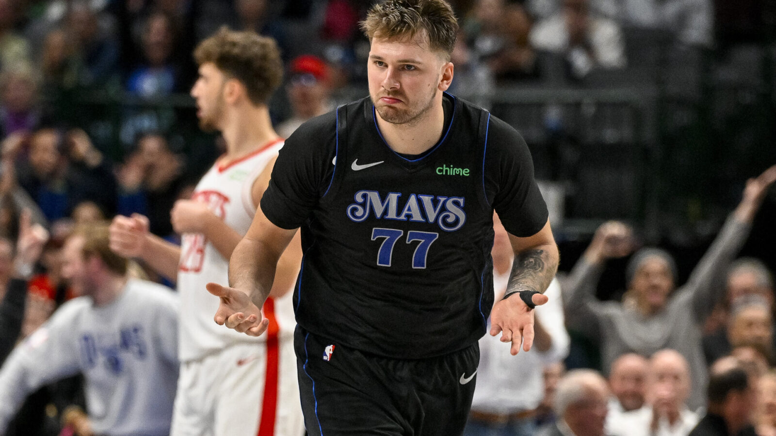 Nov 28, 2023; Dallas, Texas, USA; Dallas Mavericks guard Luka Doncic (77) reacts after he makes a basket against the Houston Rockets during the second half at the American Airlines Center