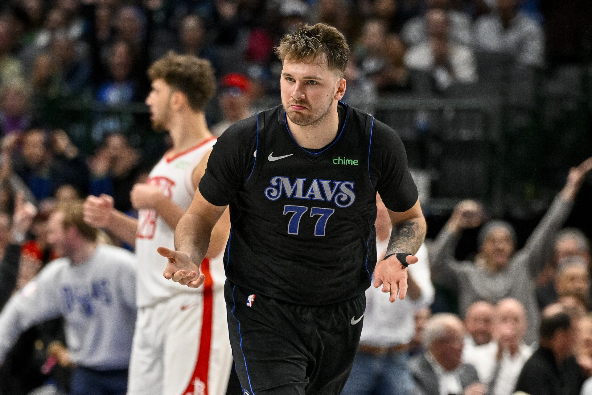 Nov 28, 2023; Dallas, Texas, USA; Dallas Mavericks guard Luka Doncic (77) reacts after he makes a basket against the Houston Rockets during the second half at the American Airlines Center