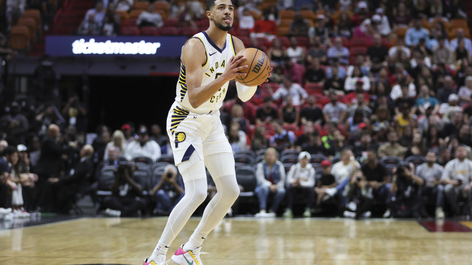 Nov 30, 2023; Miami, Florida, USA; Indiana Pacers guard Tyrese Haliburton (0) shoots the basketball against the Miami Heat during the first quarter at Kaseya Center.