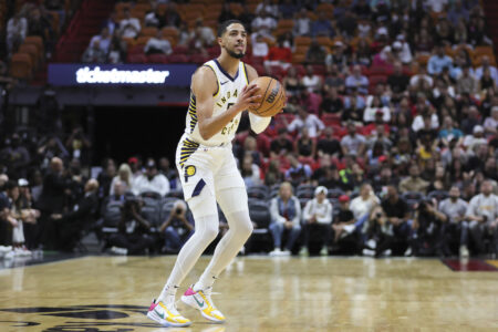 Nov 30, 2023; Miami, Florida, USA; Indiana Pacers guard Tyrese Haliburton (0) shoots the basketball against the Miami Heat during the first quarter at Kaseya Center.