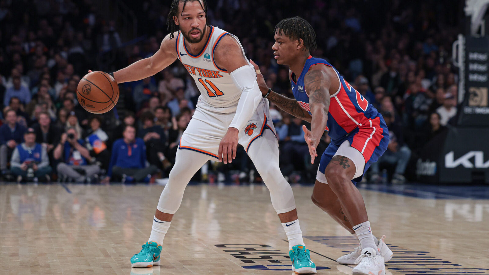 Nov 30, 2023; New York, New York, USA; New York Knicks guard Jalen Brunson (11) dribbles as Detroit Pistons guard Marcus Sasser (25) defends during the first half at Madison Square Garden.