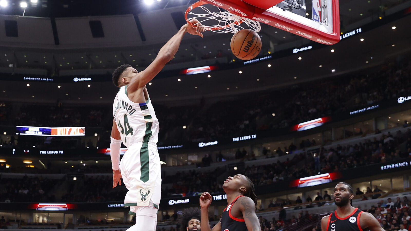 Nov 30, 2023; Chicago, Illinois, USA; Milwaukee Bucks forward Giannis Antetokounmpo (34) dunks the ball against the Chicago Bulls during the first half at United Center.