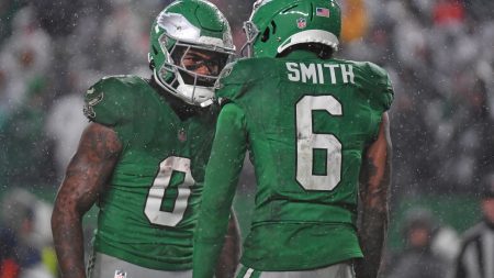 Philadelphia Eagles wide receiver DeVonta Smith (6) celebrates his touchdown catch with running back D'Andre Swift (0) against the Buffalo Bills at Lincoln Financial Field.