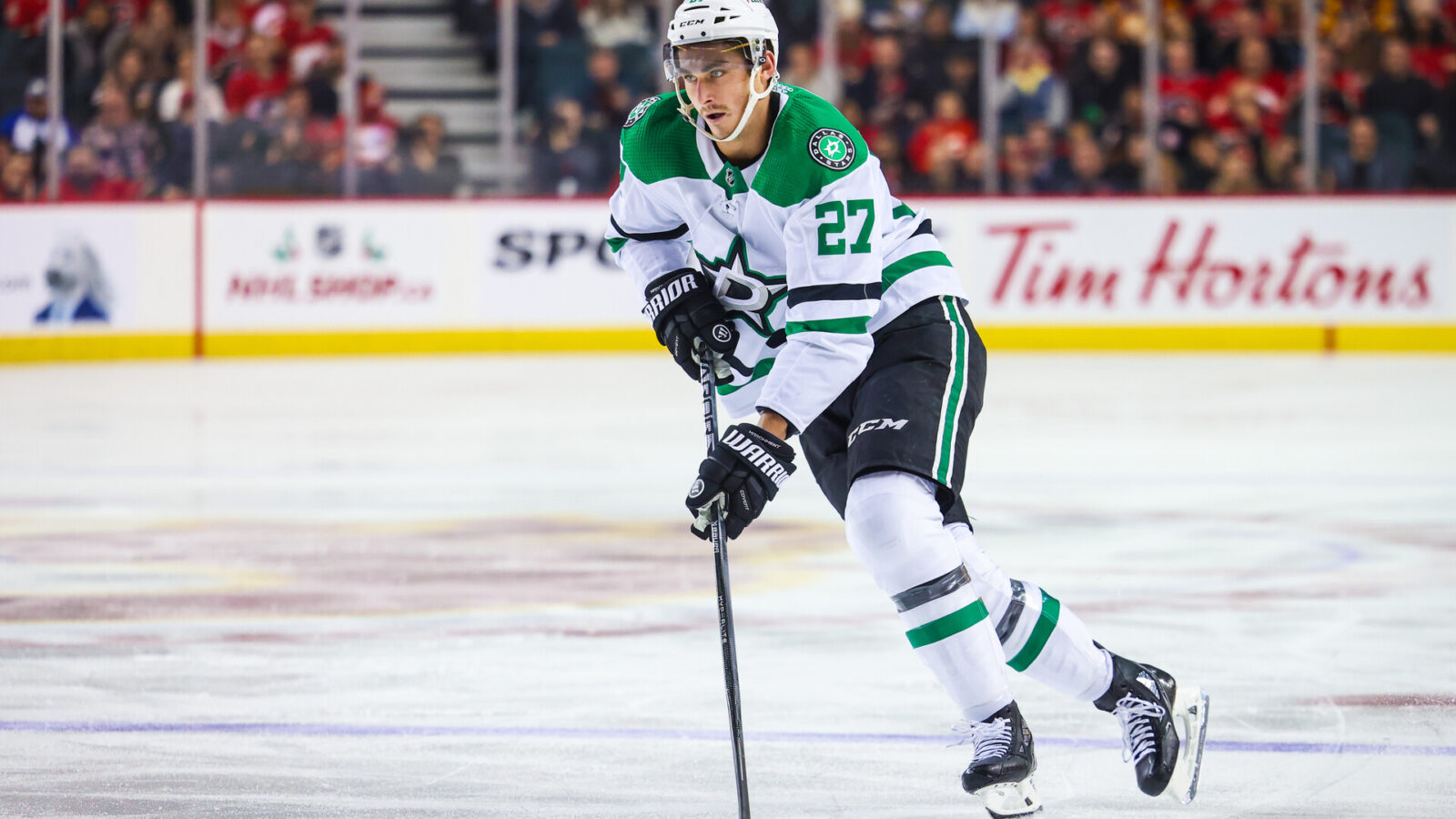 Nov 30, 2023; Calgary, Alberta, CAN; Dallas Stars left wing Mason Marchment (27) scores a goal on a penalty shot during the third period against the Calgary Flames at Scotiabank Saddledome.