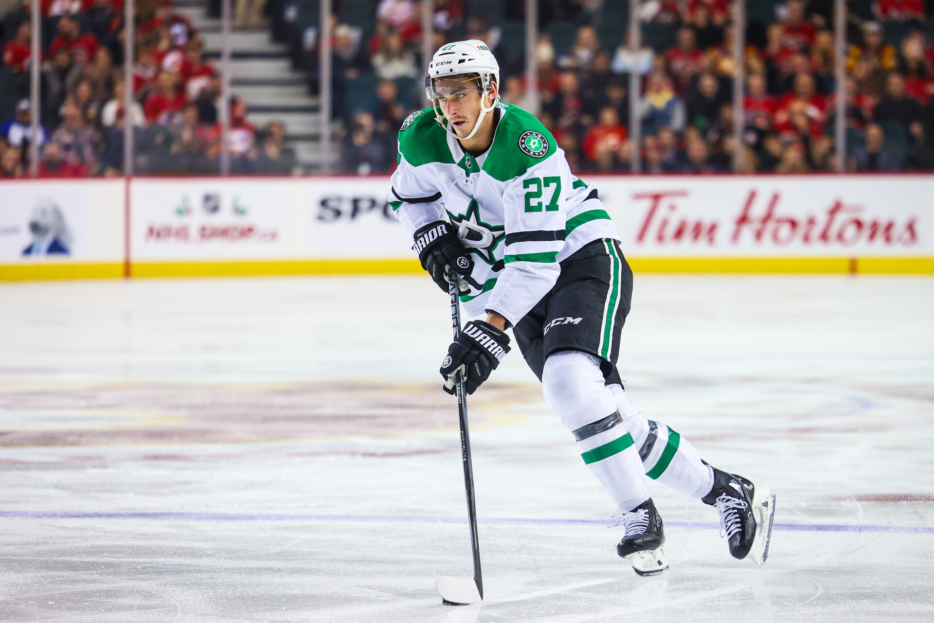 Nov 30, 2023; Calgary, Alberta, CAN; Dallas Stars left wing Mason Marchment (27) scores a goal on a penalty shot during the third period against the Calgary Flames at Scotiabank Saddledome.