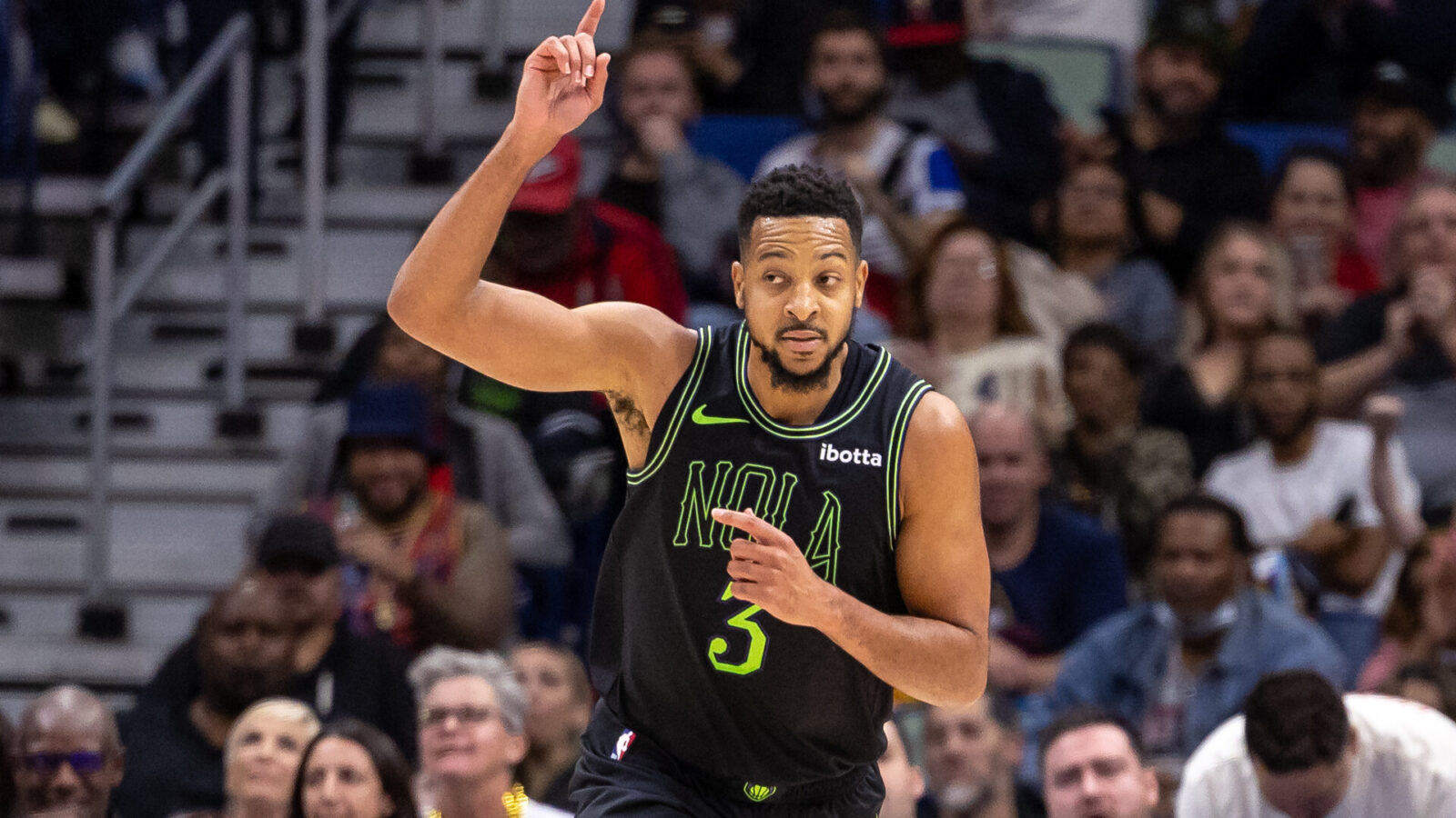 Dec 1, 2023; New Orleans, Louisiana, USA; New Orleans Pelicans guard CJ McCollum (3) reacts to making a three point basket against the San Antonio Spurs during the second half at the Smoothie King Center.