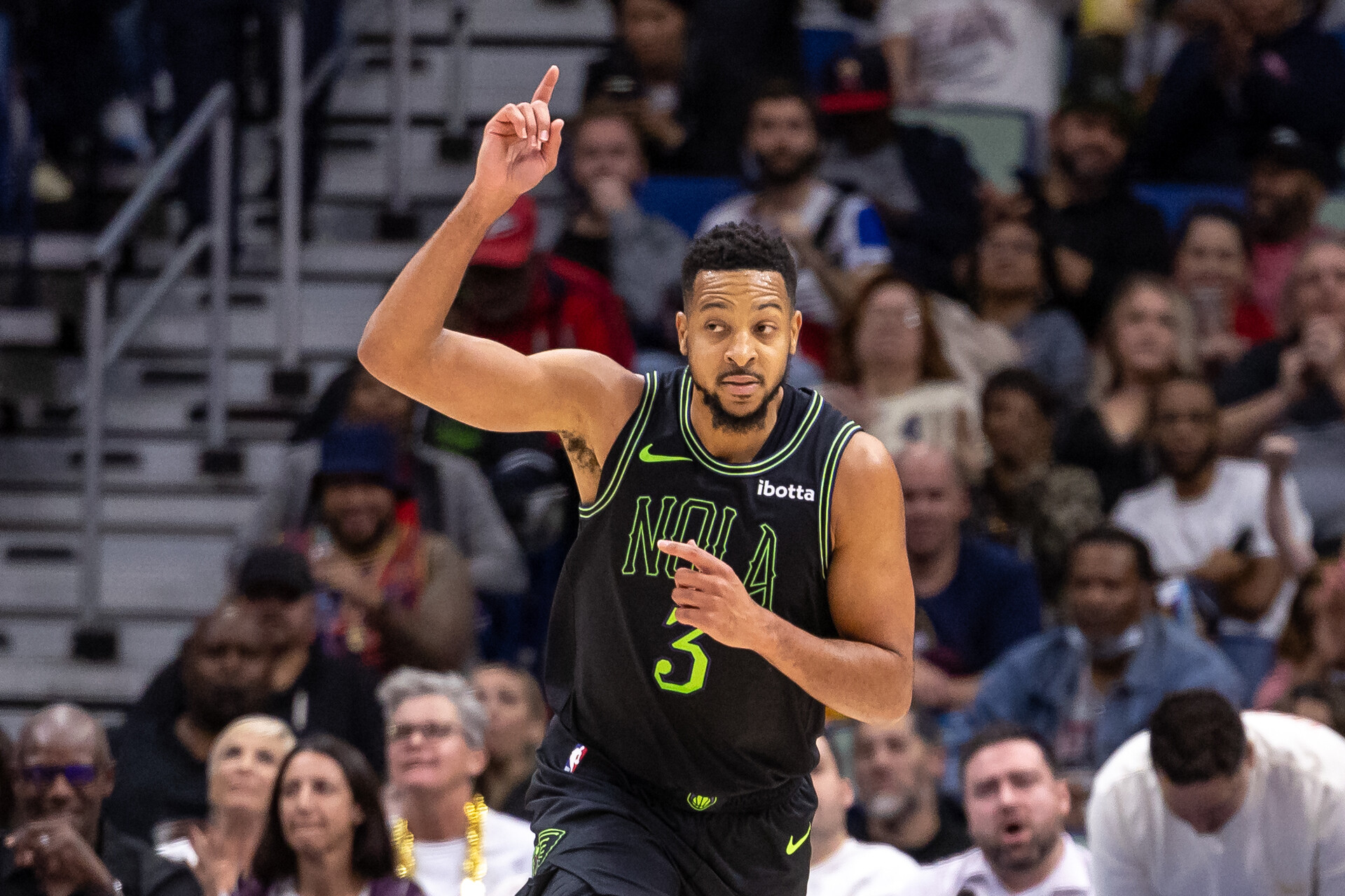 Dec 1, 2023; New Orleans, Louisiana, USA; New Orleans Pelicans guard CJ McCollum (3) reacts to making a three point basket against the San Antonio Spurs during the second half at the Smoothie King Center.