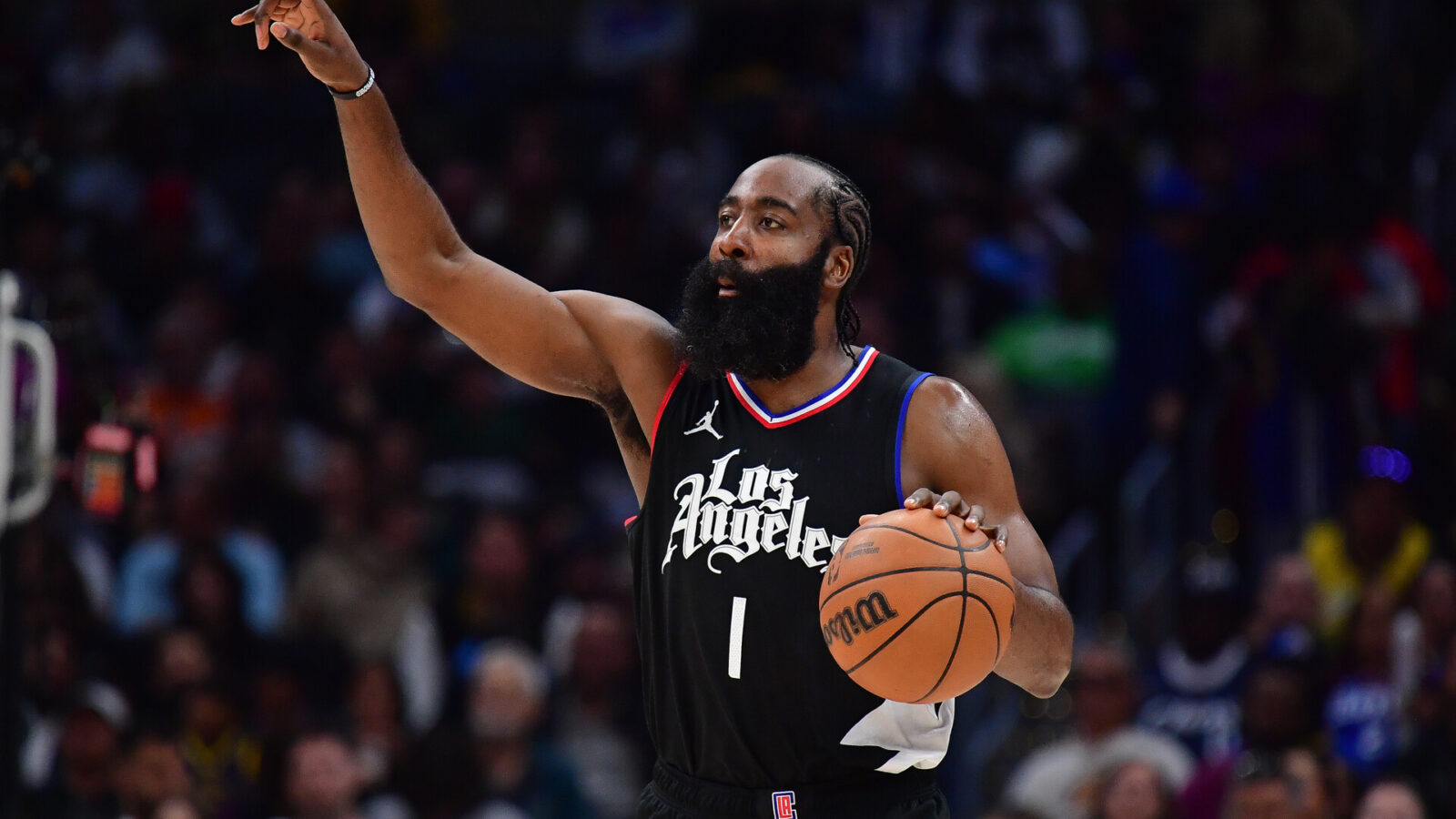Dec 2, 2023; Los Angeles, California, USA; Los Angeles Clippers guard James Harden (1) moves the ball up court against the Golden State Warriors during the second half at Crypto.com Arena.