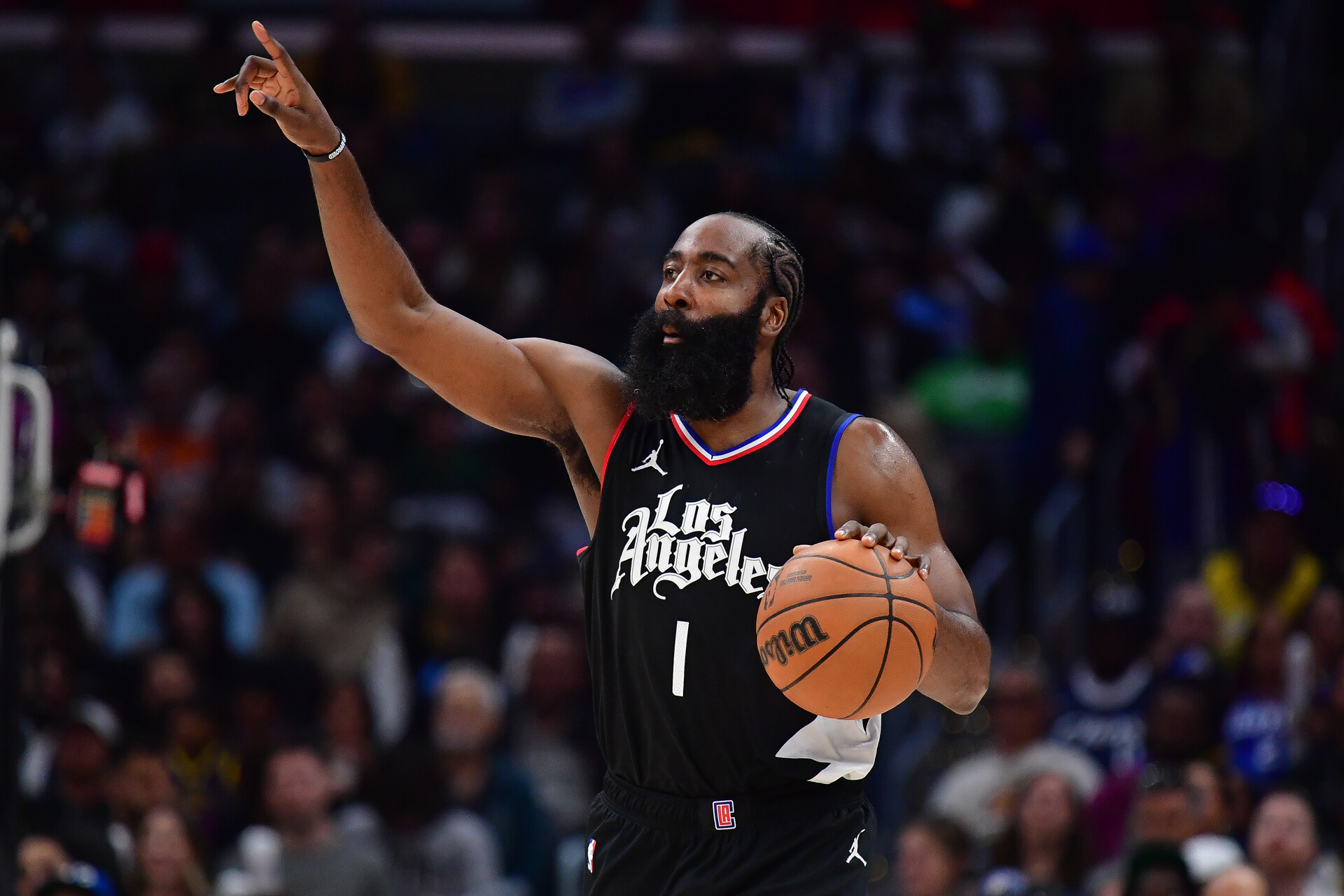 Dec 2, 2023; Los Angeles, California, USA; Los Angeles Clippers guard James Harden (1) moves the ball up court against the Golden State Warriors during the second half at Crypto.com Arena.