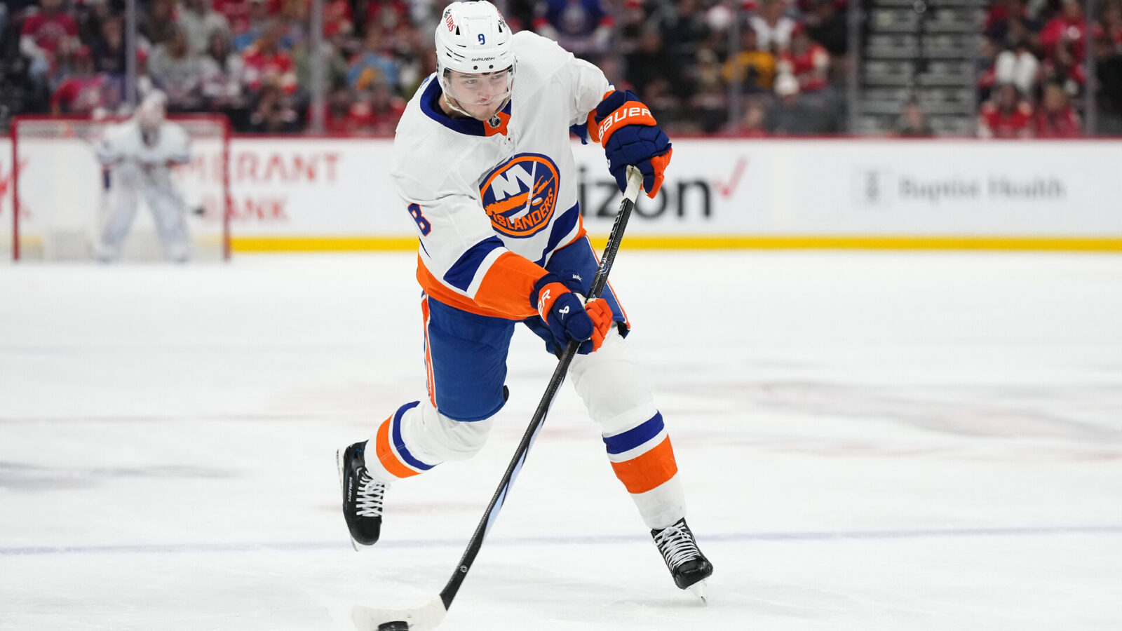 Dec 2, 2023; Sunrise, Florida, USA; New York Islanders defenseman Noah Dobson (8) shoots the puck against the Florida Panthers during the first period at Amerant Bank Arena.
