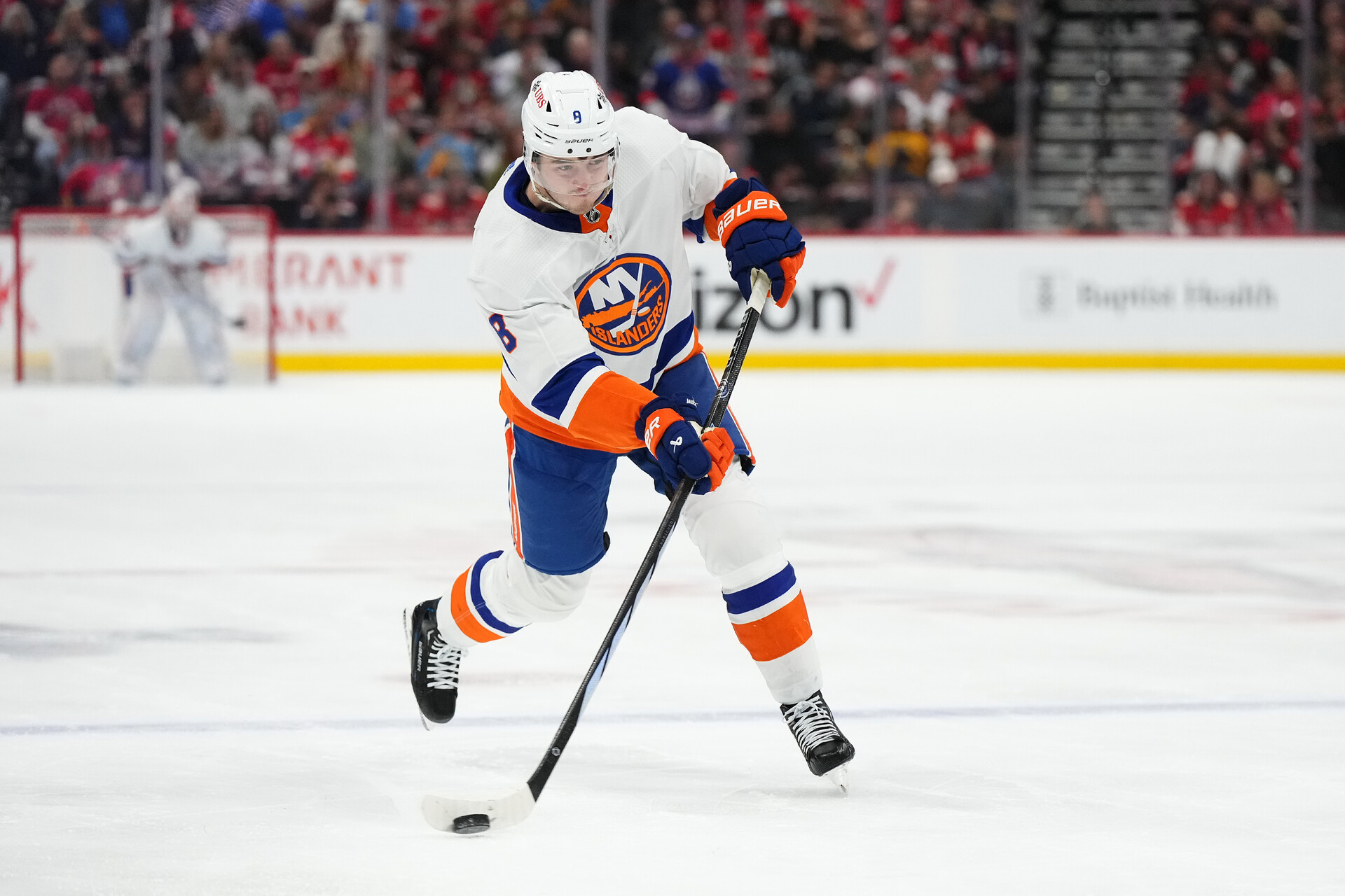 Dec 2, 2023; Sunrise, Florida, USA; New York Islanders defenseman Noah Dobson (8) shoots the puck against the Florida Panthers during the first period at Amerant Bank Arena.