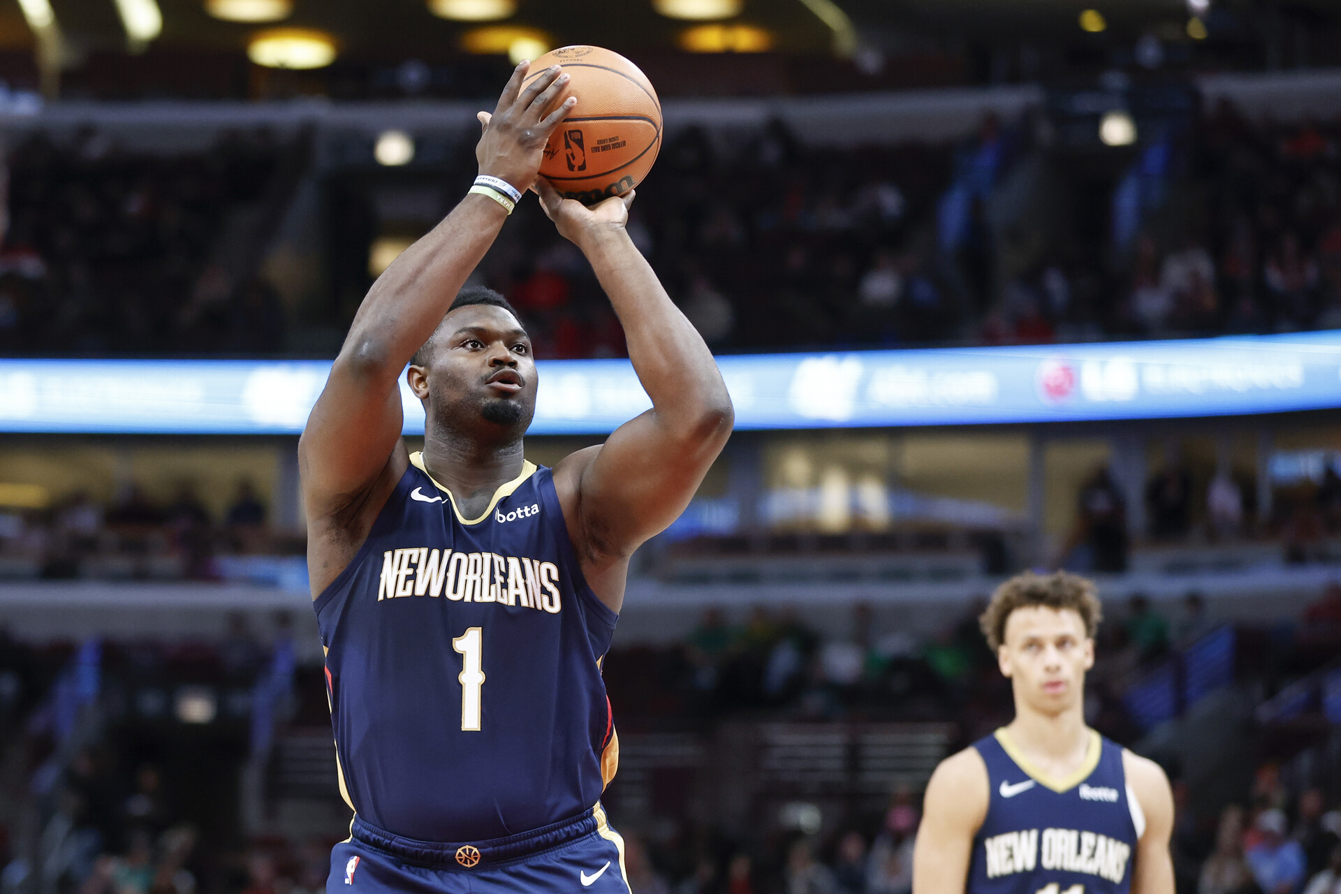 Dec 2, 2023; Chicago, Illinois, USA; New Orleans Pelicans forward Zion Williamson (1) shoots a free throw against the Chicago Bulls during the first half at United Center.