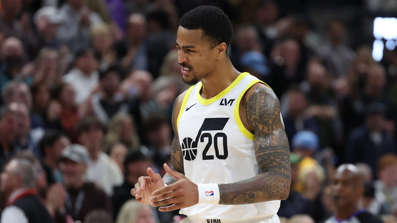 Dec 2, 2023; Salt Lake City, Utah, USA; Utah Jazz forward John Collins (20) reacts to a play against the Portland Trail Blazers with 3 seconds to play in overtime at Delta Center.