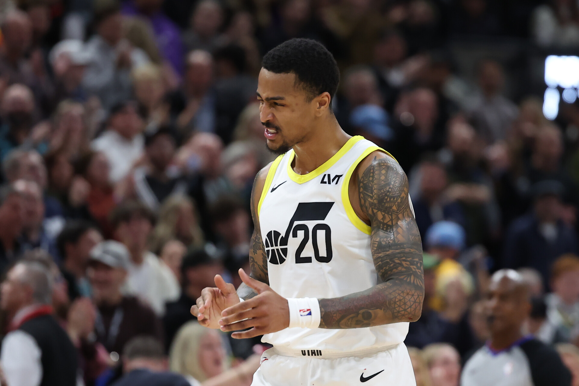 Dec 2, 2023; Salt Lake City, Utah, USA; Utah Jazz forward John Collins (20) reacts to a play against the Portland Trail Blazers with 3 seconds to play in overtime at Delta Center.