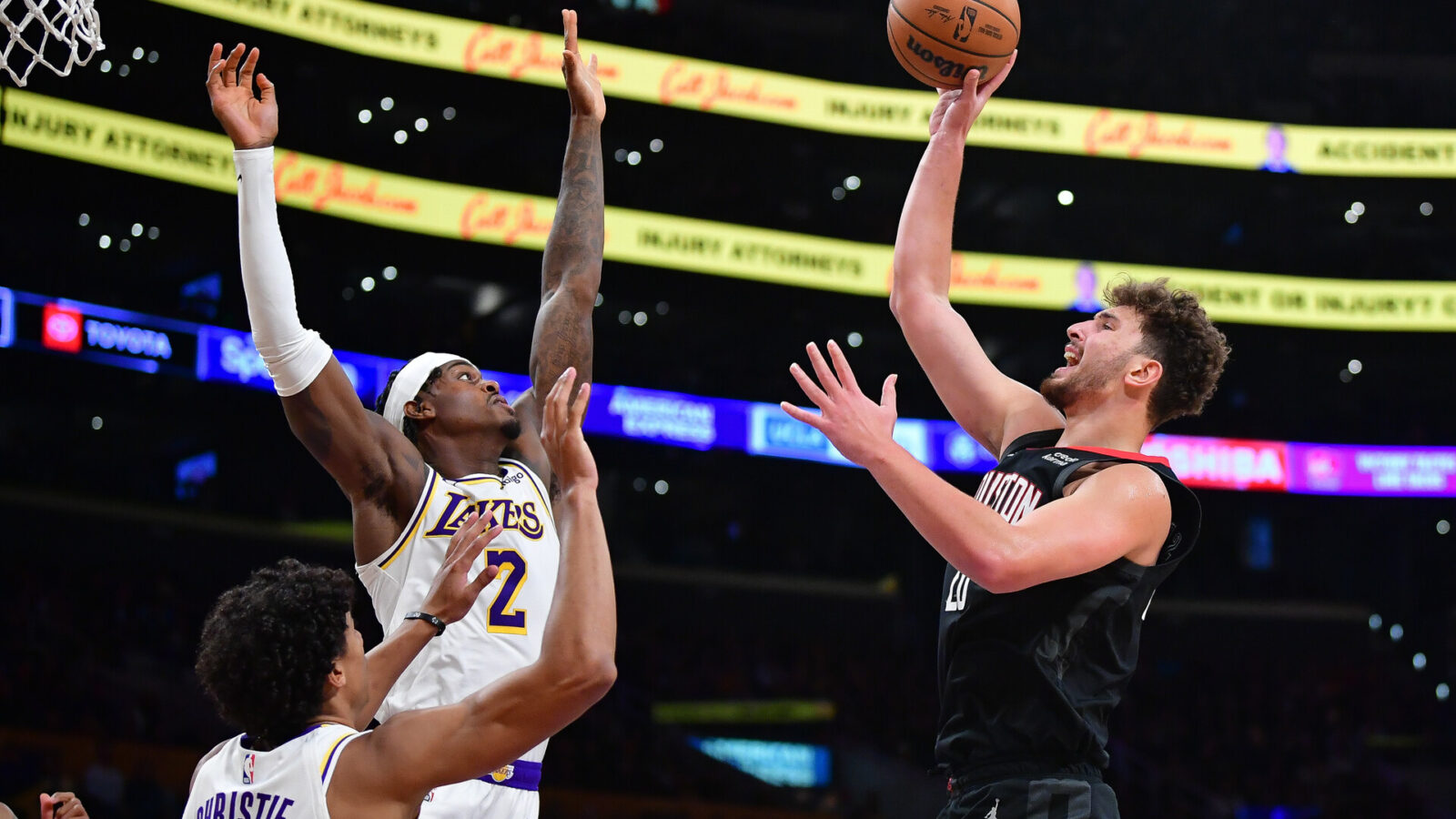 Dec 2, 2023; Los Angeles, California, USA; Houston Rockets center Alperen Sengun (28) shoots against Los Angeles Lakers forward Jarred Vanderbilt (2) during the second half at Crypto.com Arena.