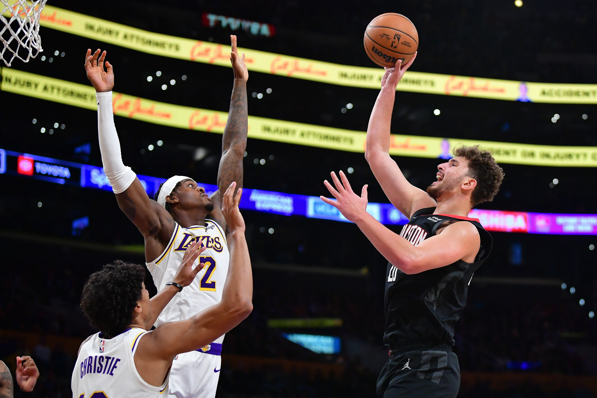 Dec 2, 2023; Los Angeles, California, USA; Houston Rockets center Alperen Sengun (28) shoots against Los Angeles Lakers forward Jarred Vanderbilt (2) during the second half at Crypto.com Arena.