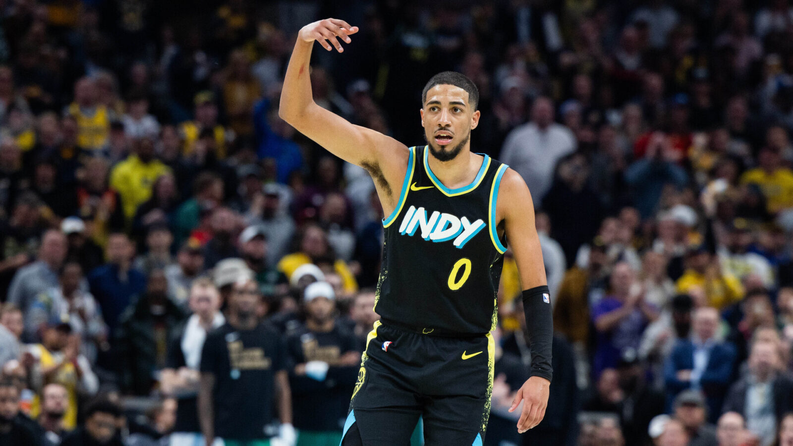 Dec 4, 2023; Indianapolis, Indiana, USA; Indiana Pacers guard Tyrese Haliburton (0) celebrates a made basket in the second half against the Boston Celtics at Gainbridge Fieldhouse.
