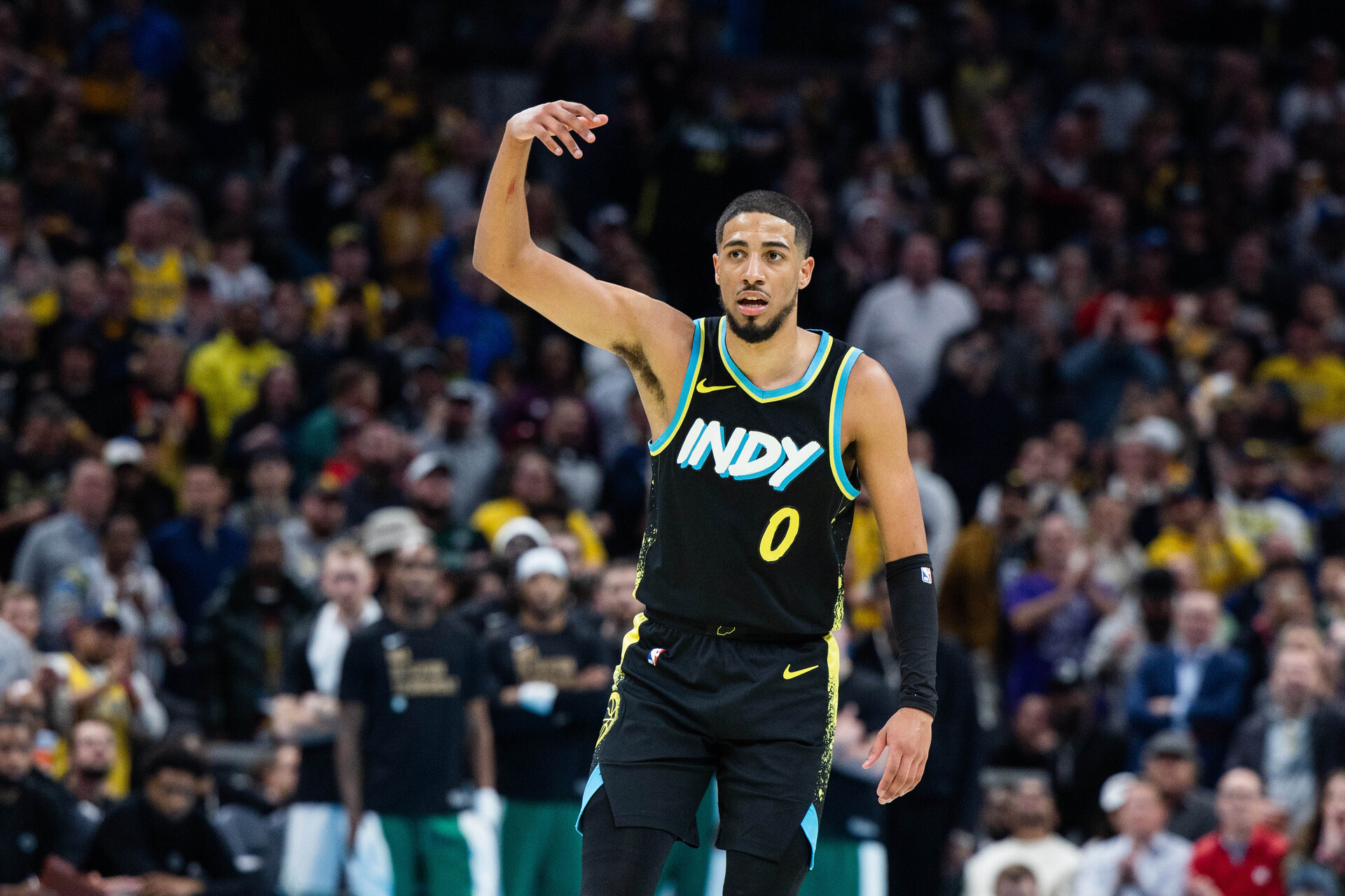 Dec 4, 2023; Indianapolis, Indiana, USA; Indiana Pacers guard Tyrese Haliburton (0) celebrates a made basket in the second half against the Boston Celtics at Gainbridge Fieldhouse.
