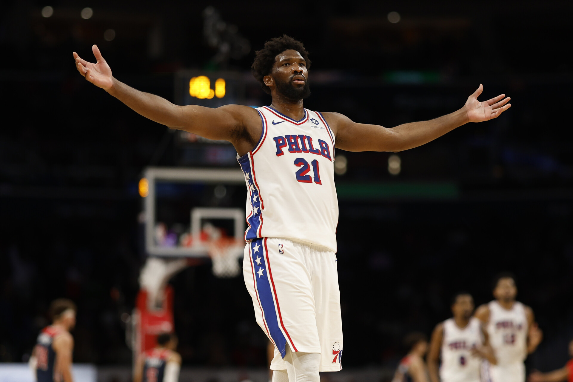 Dec 6, 2023; Washington, District of Columbia, USA; Philadelphia 76ers center Joel Embiid (21) celebrates after scoring his 50th point of the game against the Washington Wizards in the fourth quarter at Capital One Arena.