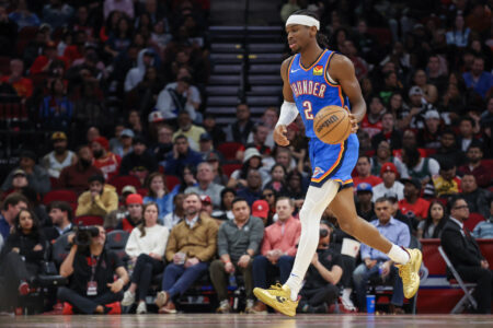 Dec 6, 2023; Houston, Texas, USA; Oklahoma City Thunder guard Shai Gilgeous-Alexander (2) dribbles against the Houston Rockets in the second half at Toyota Center.