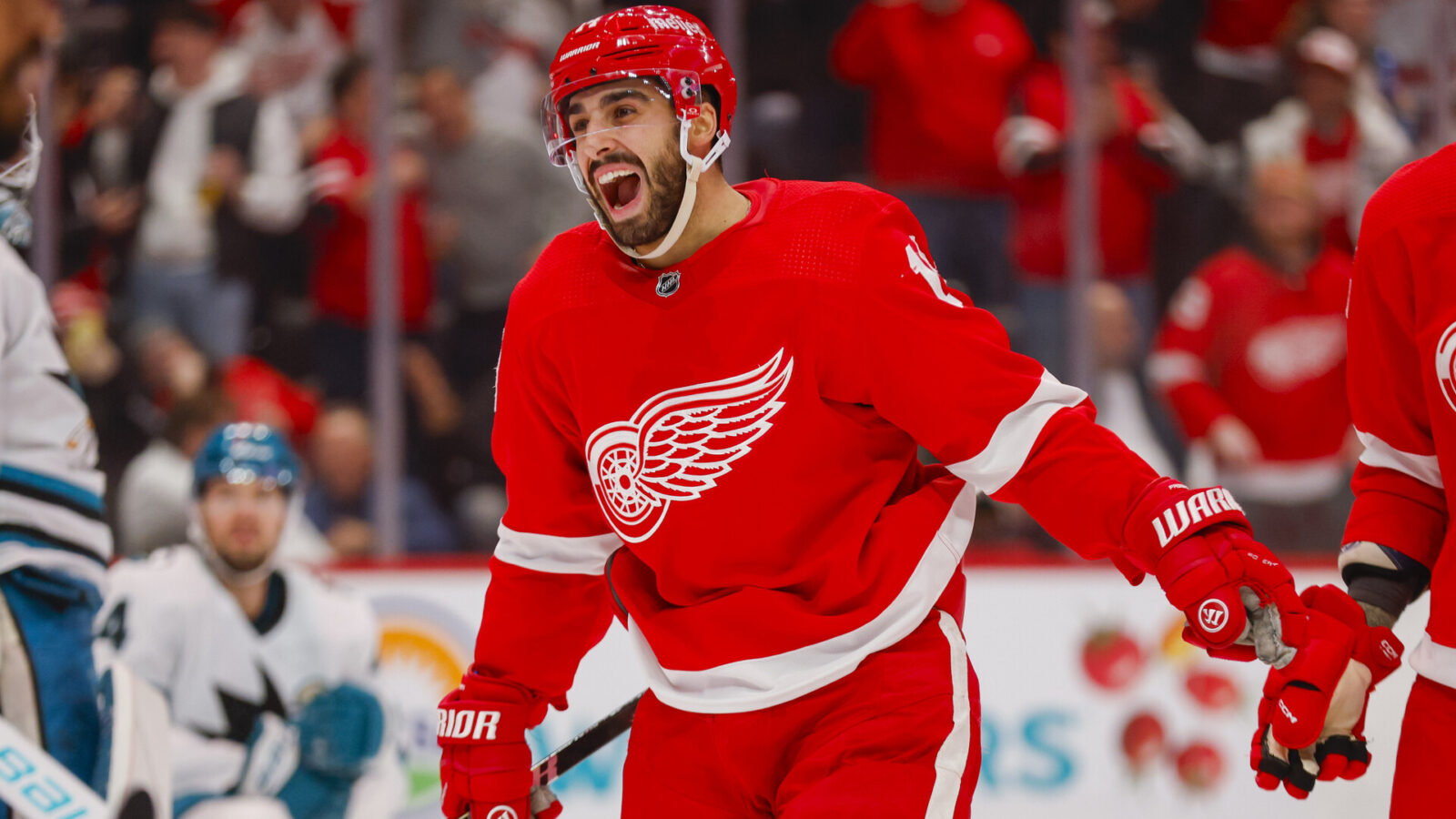 Dec 7, 2023; Detroit, Michigan, USA; Detroit Red Wings center Robby Fabbri (14) reacts to a goal by left wing Lucas Raymond (23) during the second period at Little Caesars Arena.