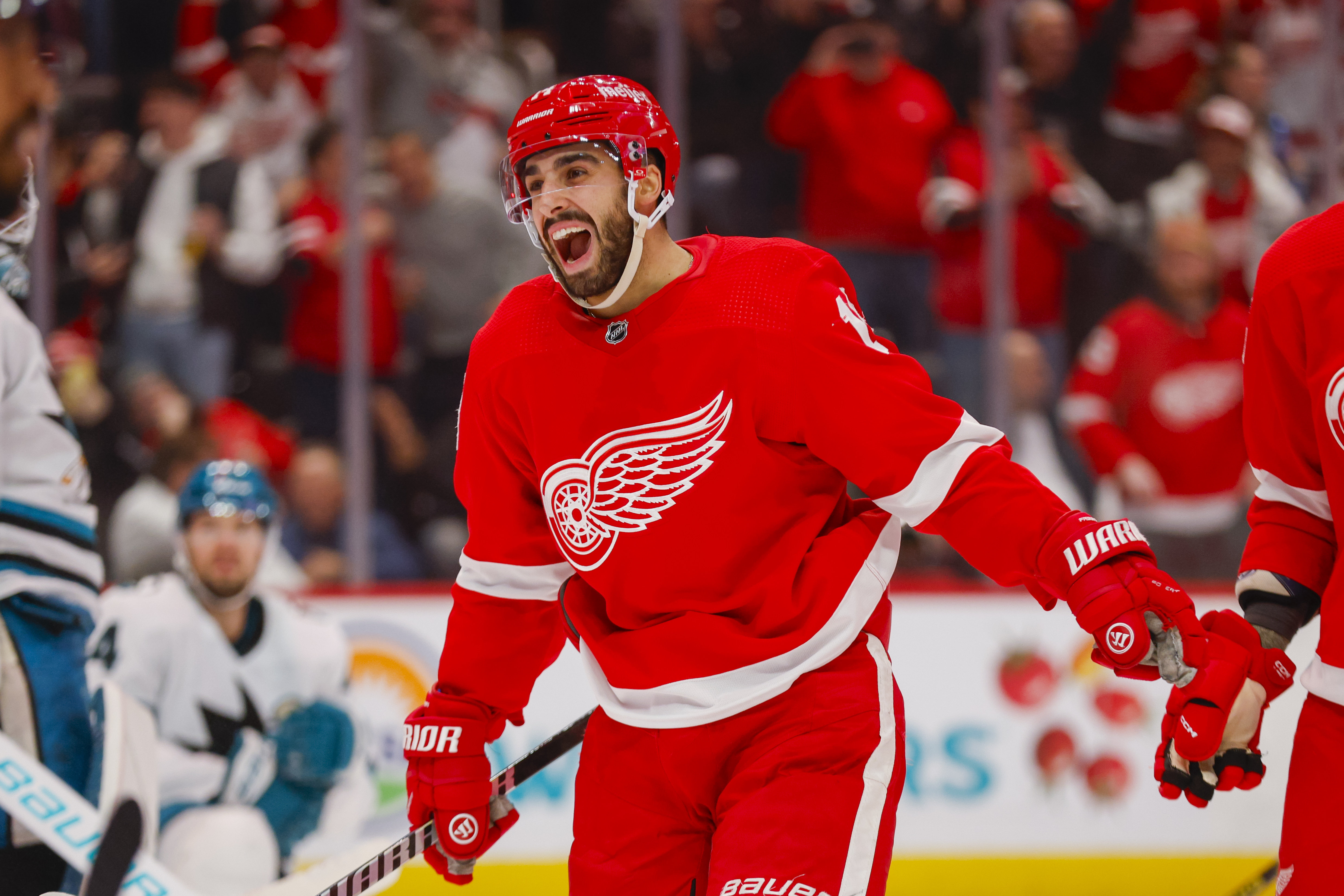 Dec 7, 2023; Detroit, Michigan, USA; Detroit Red Wings center Robby Fabbri (14) reacts to a goal by left wing Lucas Raymond (23) during the second period at Little Caesars Arena.