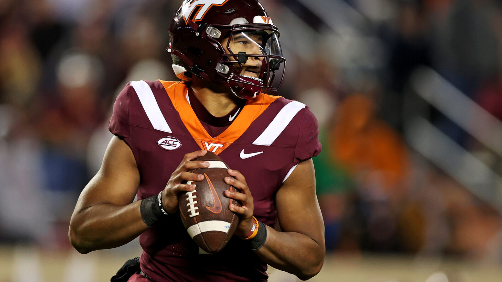 Virginia Tech Hokies quarterback Kyron Drones (1) throws a pass against the North Carolina State Wolfpack at Lane Stadium.
