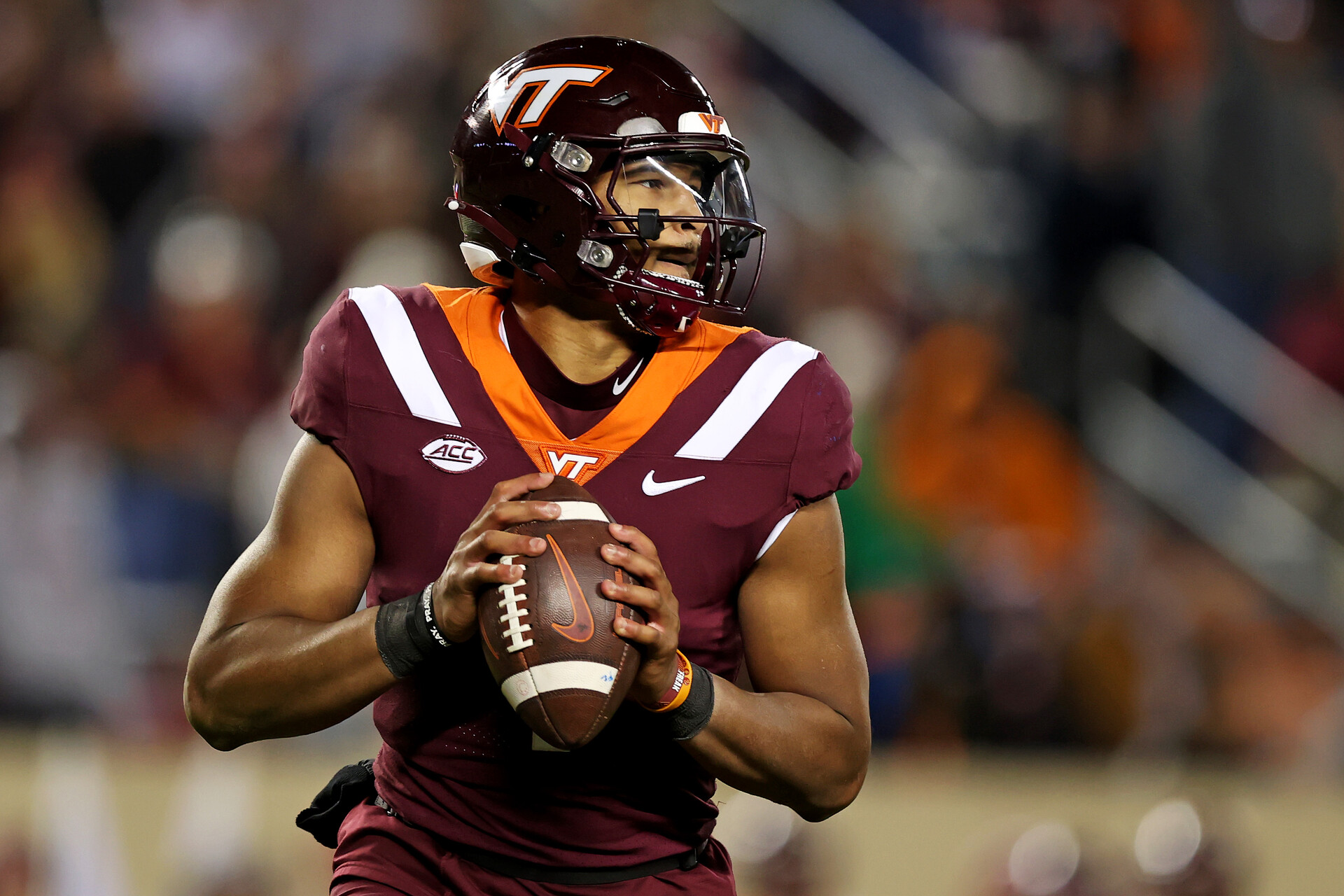 Virginia Tech Hokies quarterback Kyron Drones (1) throws a pass against the North Carolina State Wolfpack at Lane Stadium.