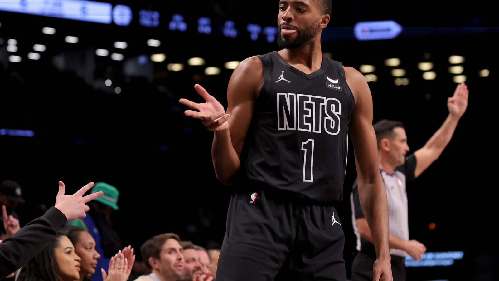 Dec 8, 2023; Brooklyn, New York, USA; Brooklyn Nets forward Mikal Bridges (1) celebrates his three point shot against the Washington Wizards during the first quarter at Barclays Center.