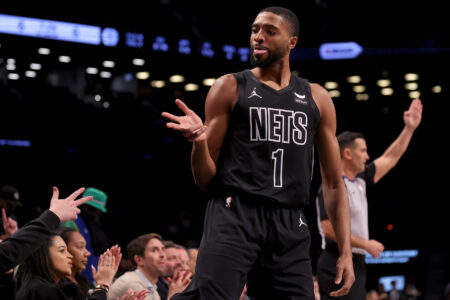 Dec 8, 2023; Brooklyn, New York, USA; Brooklyn Nets forward Mikal Bridges (1) celebrates his three point shot against the Washington Wizards during the first quarter at Barclays Center.