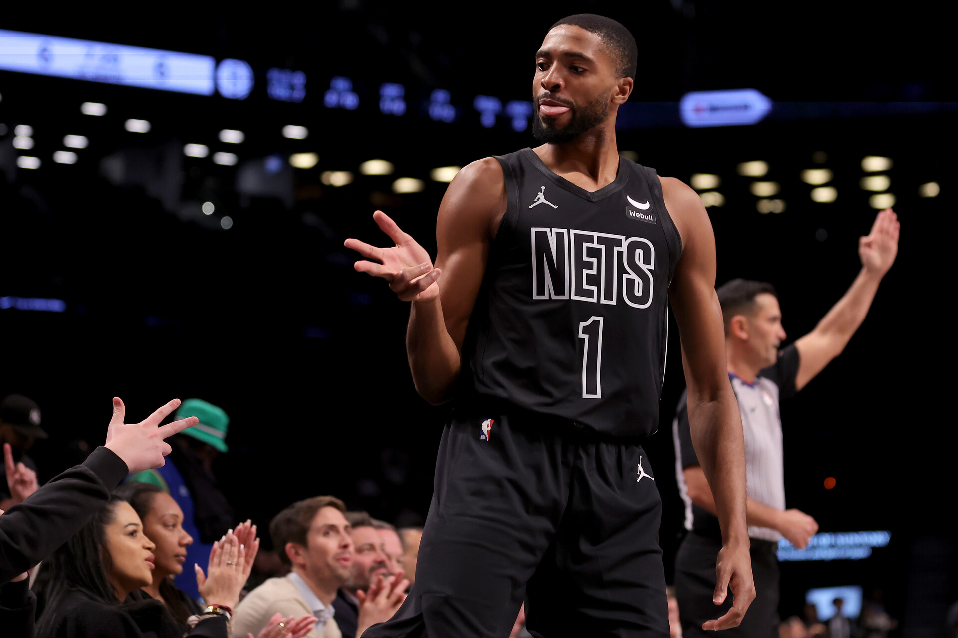 Dec 8, 2023; Brooklyn, New York, USA; Brooklyn Nets forward Mikal Bridges (1) celebrates his three point shot against the Washington Wizards during the first quarter at Barclays Center.