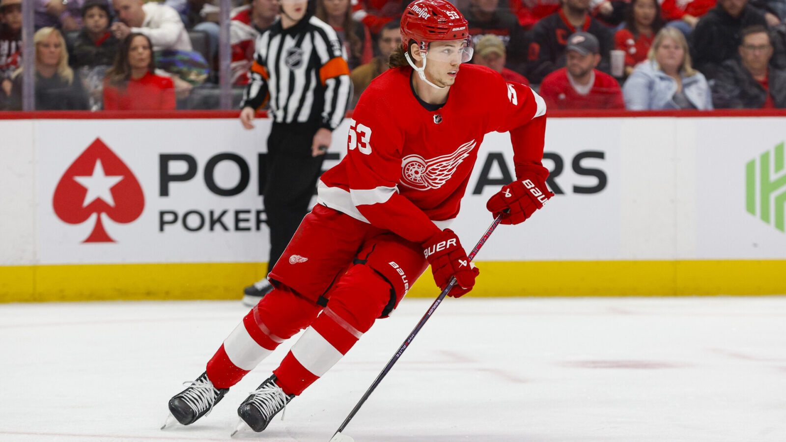 Dec 9, 2023; Detroit, Michigan, USA; Detroit Red Wings defenseman Moritz Seider (53) handles the puck during the first period at Little Caesars Arena.