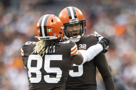Cleveland Browns quarterback Joe Flacco (15) congratulates tight end David Njoku (85) on his touchdown run against the Jacksonville Jaguars during the second quarter at Cleveland Browns Stadium.