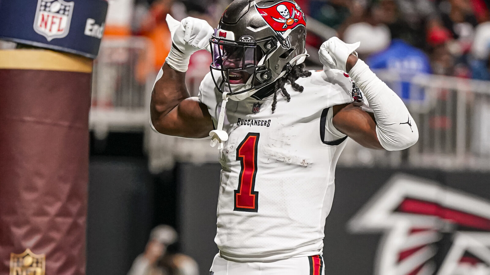 Tampa Bay Buccaneers running back Rachaad White (1) reacts after scoring a touchdown against the Atlanta Falcons at Mercedes-Benz Stadium.