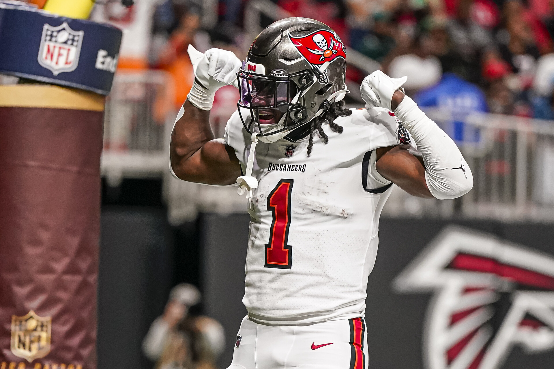 Tampa Bay Buccaneers running back Rachaad White (1) reacts after scoring a touchdown against the Atlanta Falcons at Mercedes-Benz Stadium.