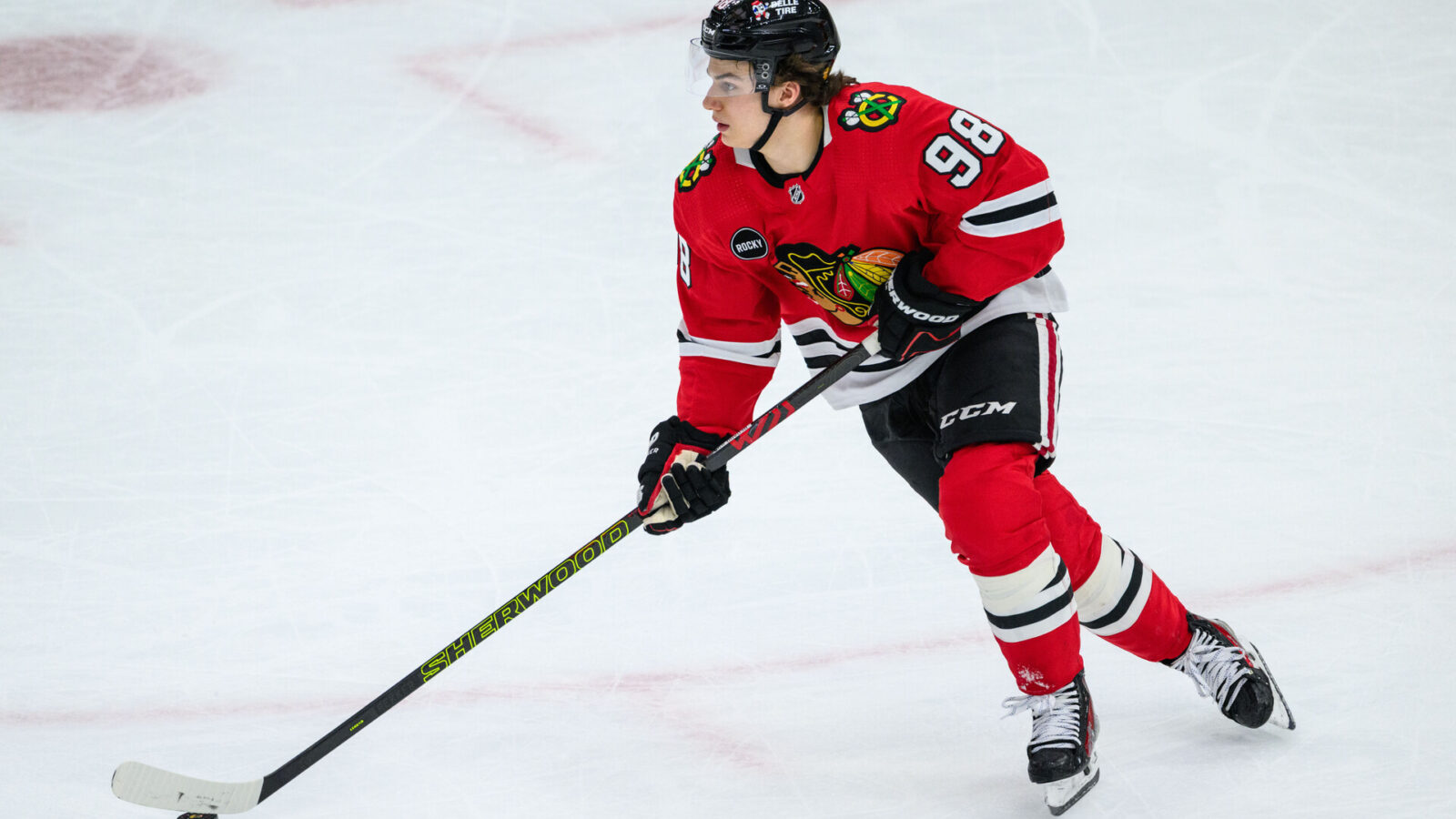Dec 10, 2023; Chicago, Illinois, USA; Chicago Blackhawks center Connor Bedard (98) skates with the puck against the Washington Capitals during the third period at the United Center.