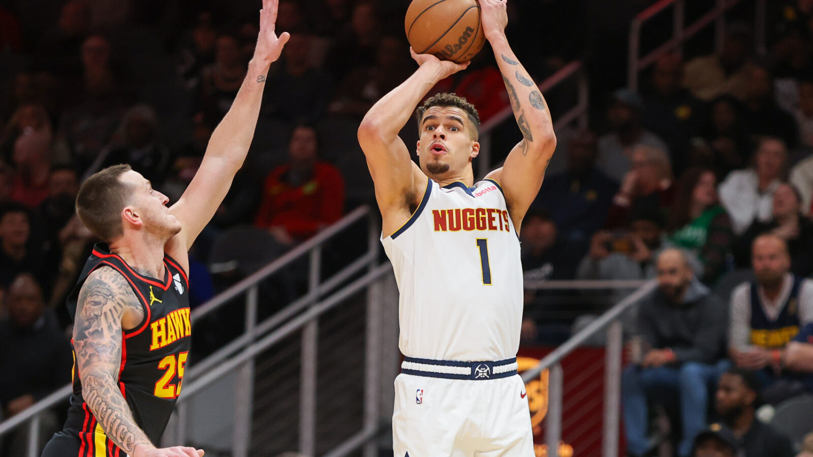 Dec 11, 2023; Atlanta, Georgia, USA; Denver Nuggets forward Michael Porter Jr. (1) shoots against the Atlanta Hawks in the first quarter at State Farm Arena.