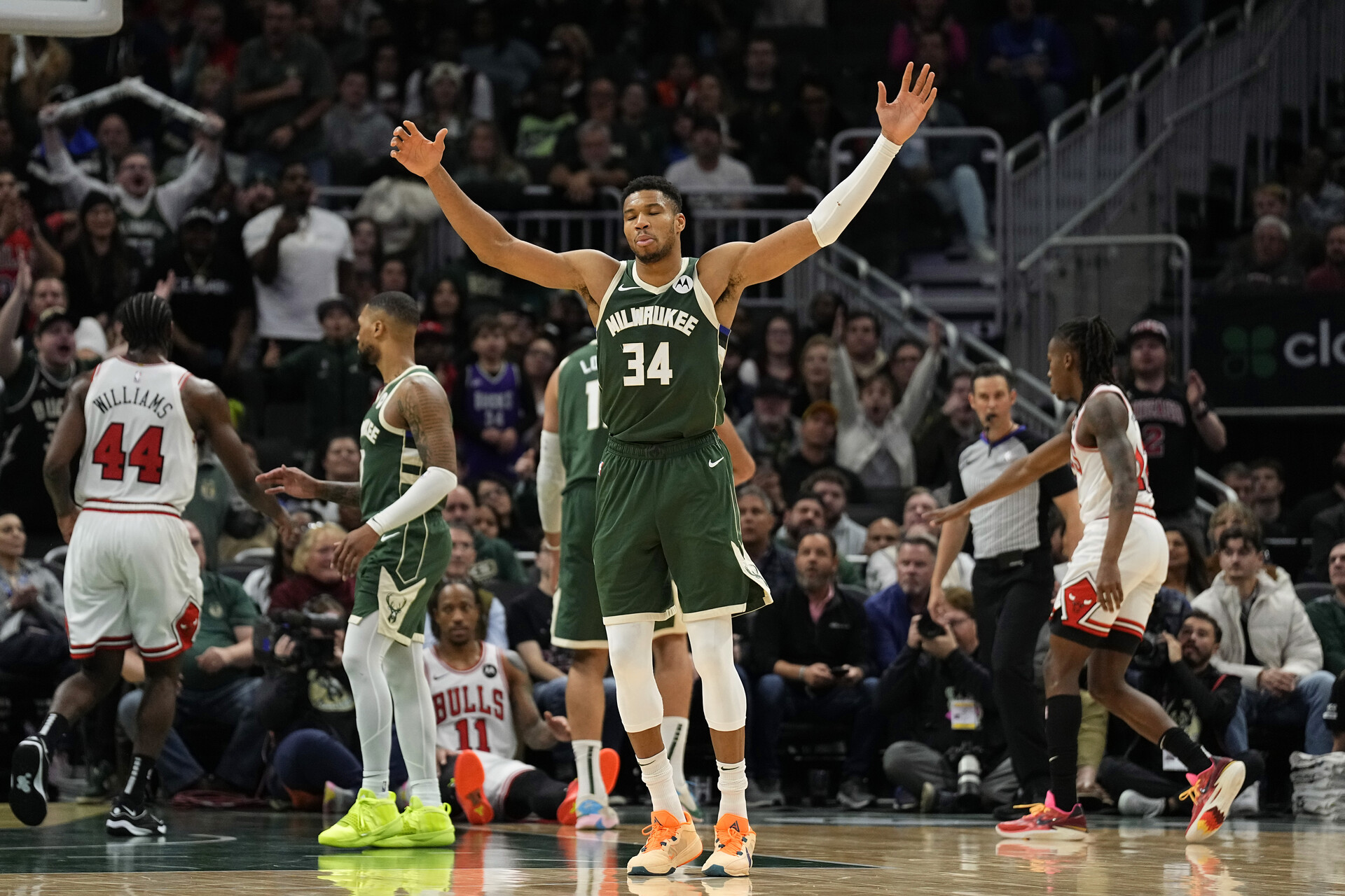 Dec 11, 2023; Milwaukee, Wisconsin, USA; Milwaukee Bucks forward Giannis Antetokounmpo (34) reacts to a call during overtime against the Chicago Bulls at Fiserv Forum.