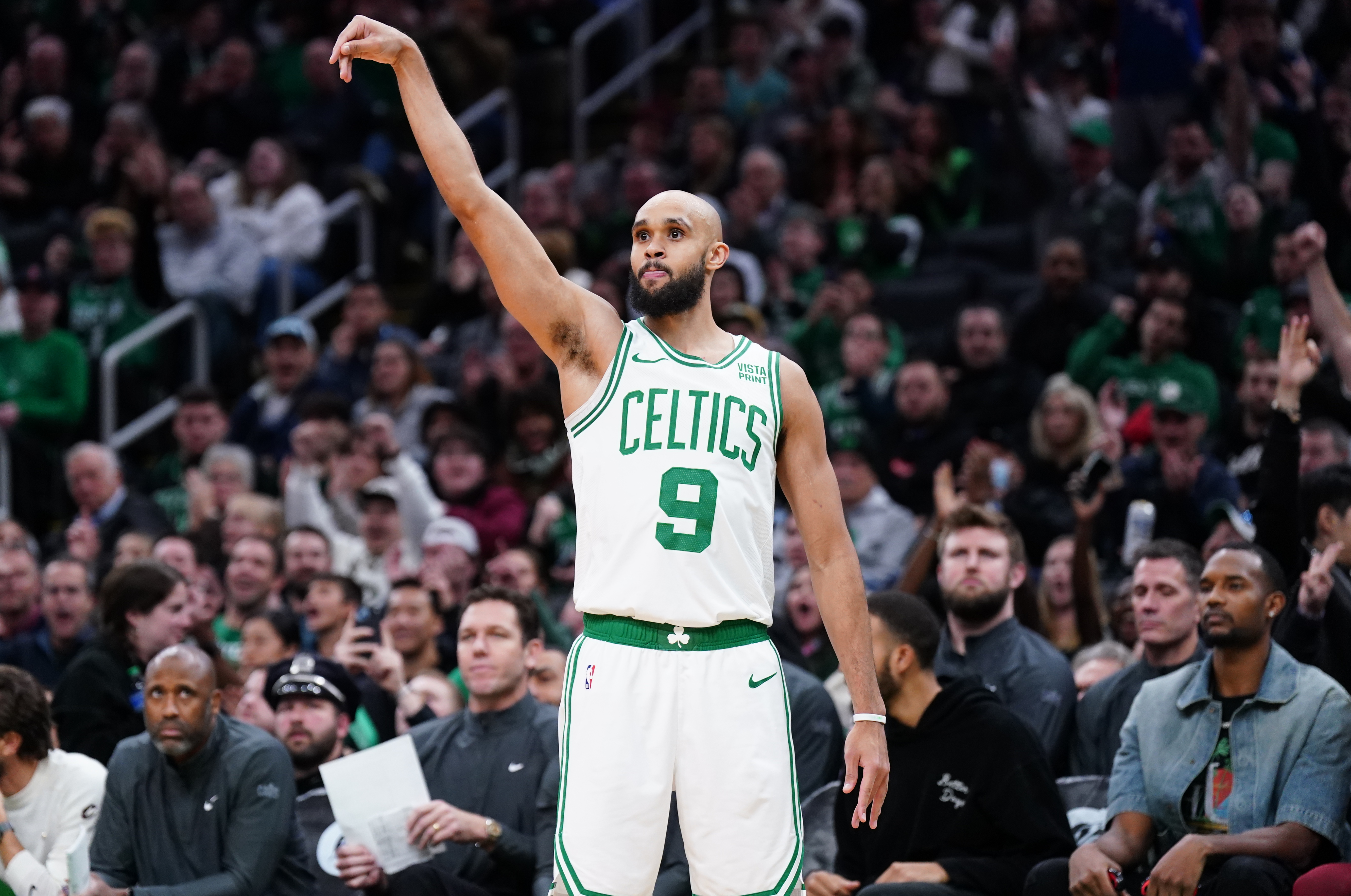 Dec 12, 2023; Boston, Massachusetts, USA; Boston Celtics guard Derrick White (9) reacts after his three point basket against the Cleveland Cavaliers in the second half at TD Garden.