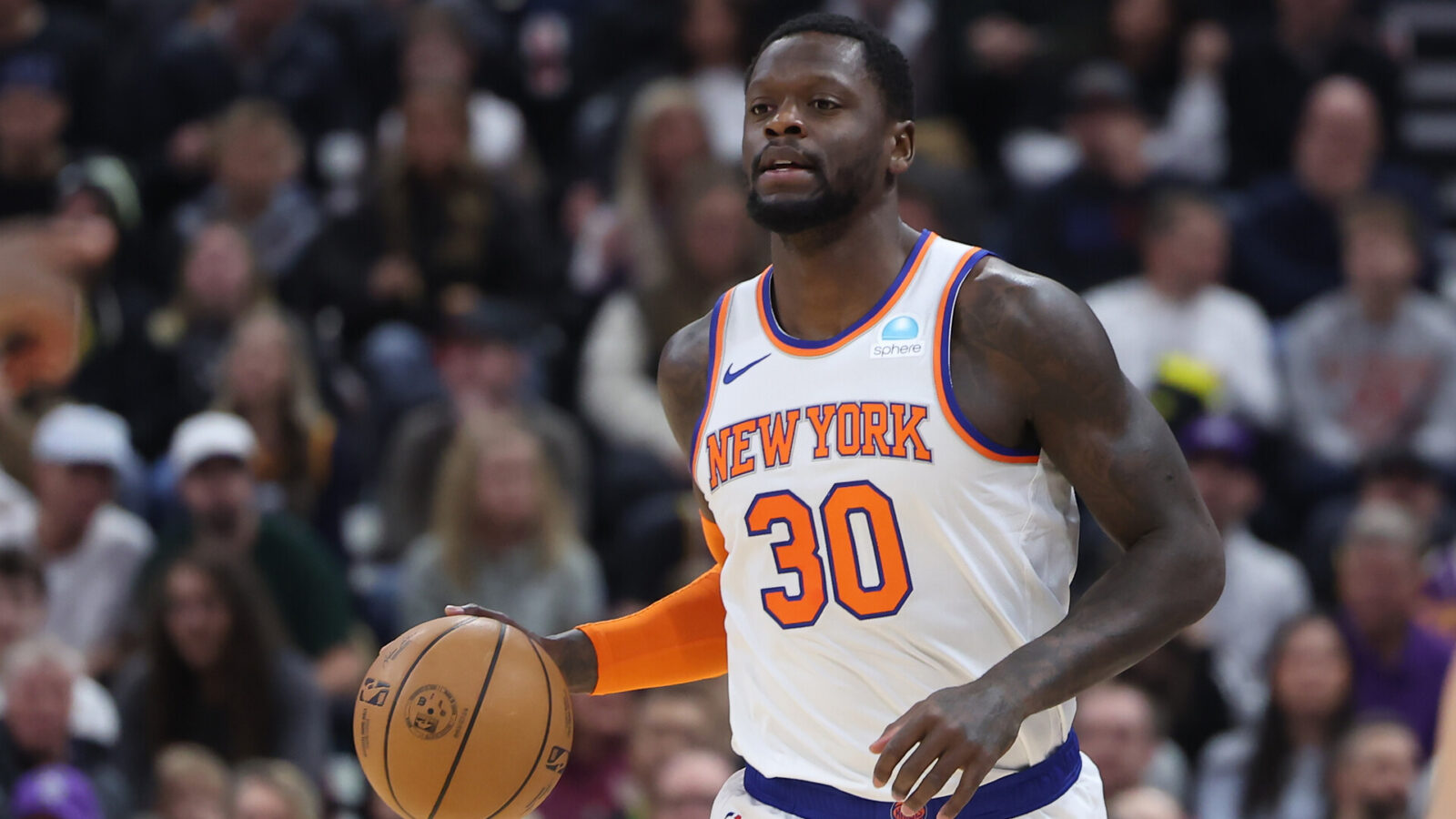 Dec 13, 2023; Salt Lake City, Utah, USA; New York Knicks forward Julius Randle (30) brings the ball up the court against the Utah Jazz during the first quarter at Delta Center.